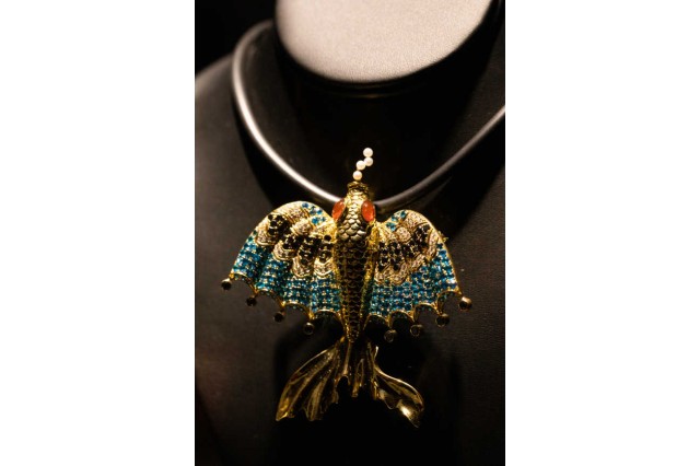 Install shot of fish pendant