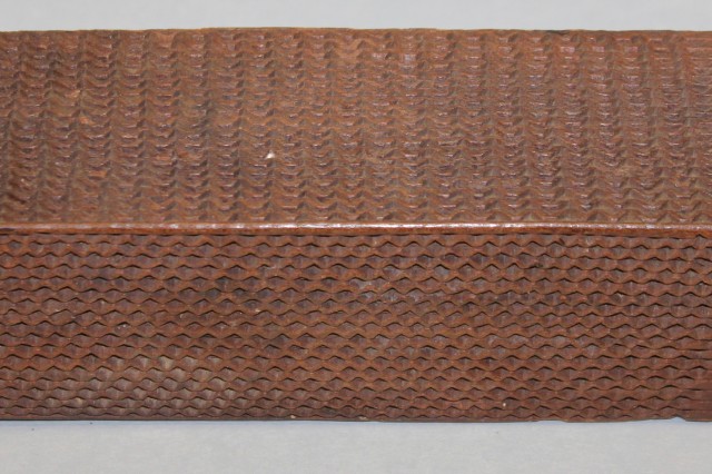Anthro - Bark cloth (tapa), detail of tapa beater with fine texture 