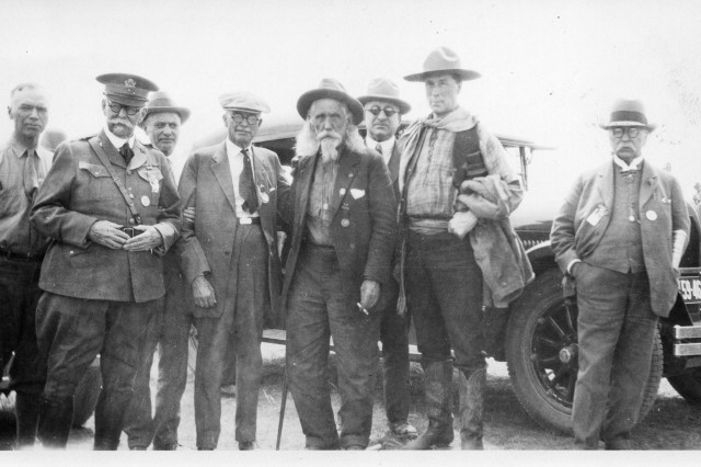 P-075-14-012d, William S. Hart and a group of men standing in front of a car 