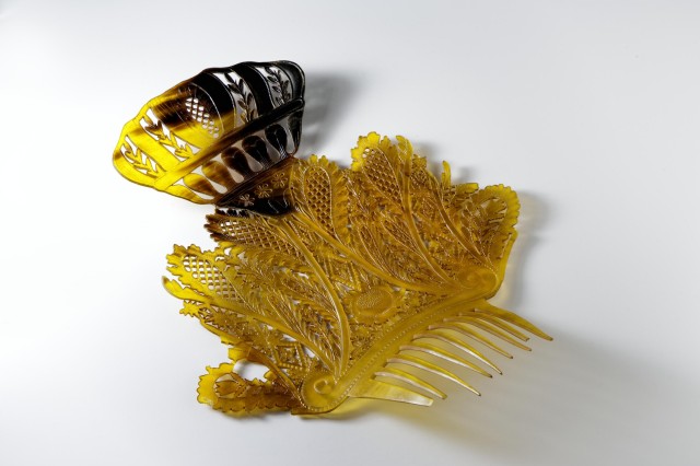 intricate, decorative tortoise shell colored comb