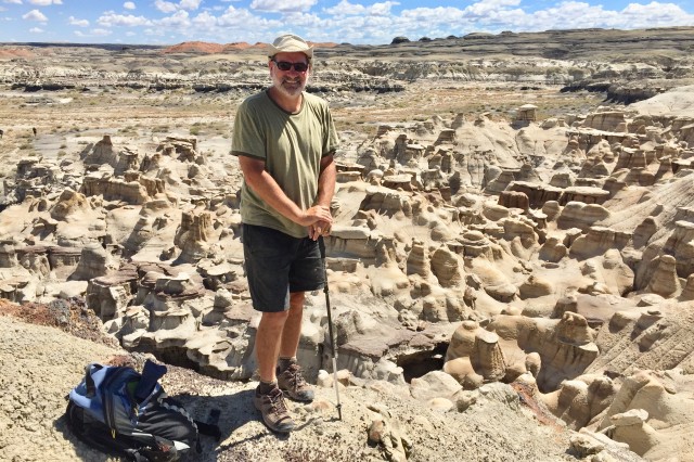 Luis Chiappe standing near an excavation site. 