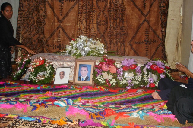 Tapa and woven mats as gifts at a funeral