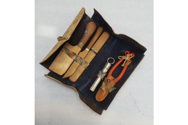 Photo of a kit containing five different wood and metal hand tools