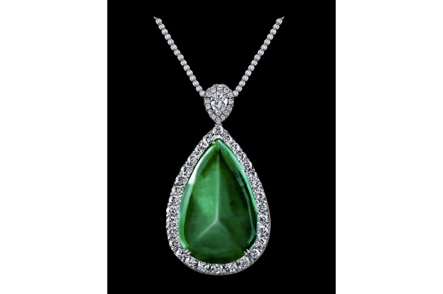 Jade of Muzo. Pear-shaped, cabochon-cut emerald and diamonds.