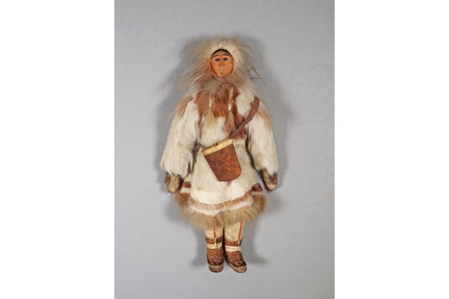 doll wearing furs and sealskin boots