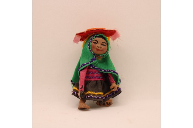 doll of Peruvian woman made of clay and fabric 