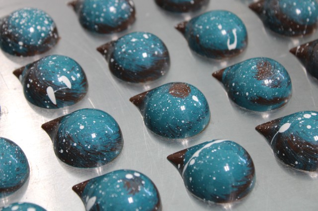 blue chocolates on tray 