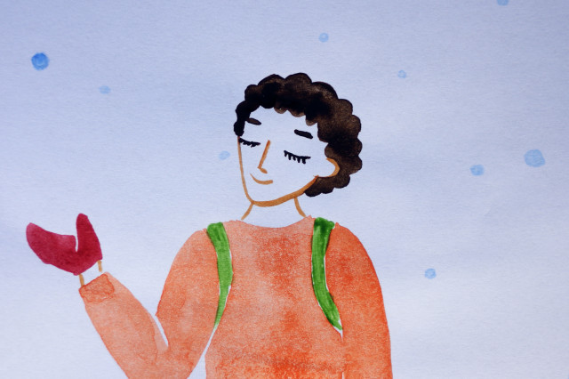 Drawing of a person with short curly hair, orange sweater, and gesturing with red-gloved hand