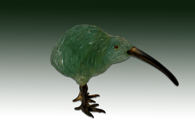 Kiwi carved in pale green nephrite stone.