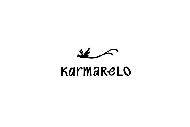 a black silhouette of a long tailed bird flies over the text "Karmarelo"