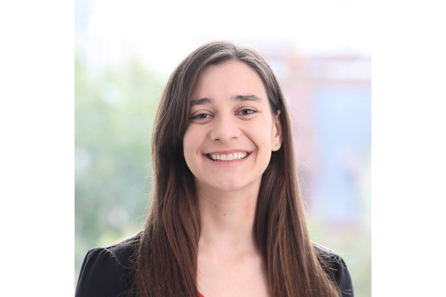 Head and shoulders portrait of Lauren Cooper smiling