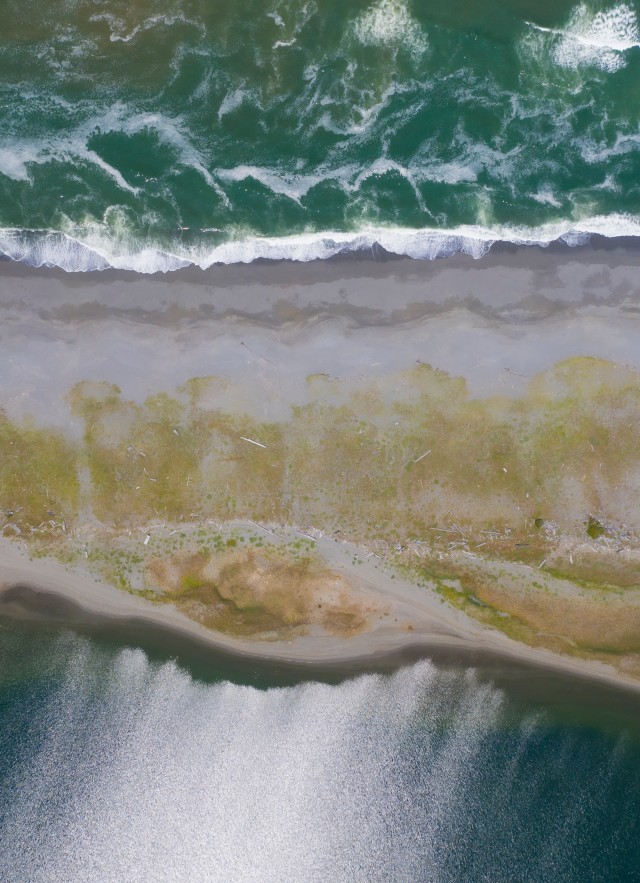 aerial view of waves on a beach