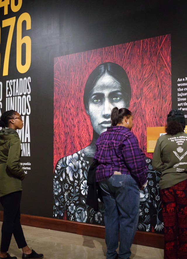 Visitors at Becoming Los Angeles exhibition