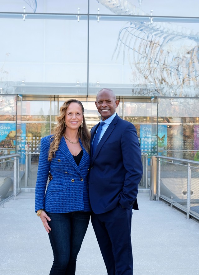Celia and Joe Ward-Wallace in front of the Otis Booth Pavilion at the Natural History Museum of Los Angeles County