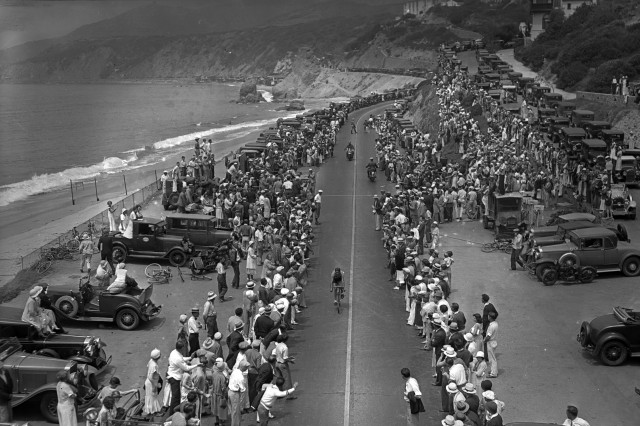 black and white image of motorcycles driving down pch seaver center