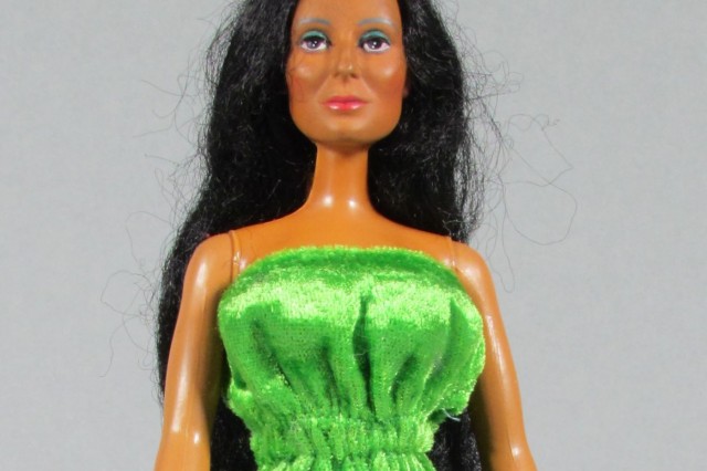 Cher doll with green dress