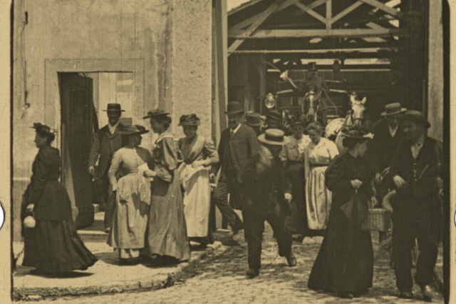  A cropped, single-frame close-up of an original Lumière film frame depicting workers departing the factory.  