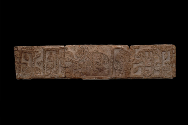ancient stone glyph