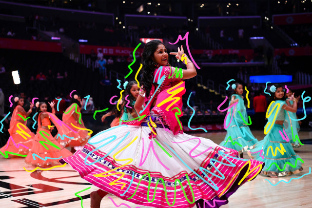 Swirls atop a woman and children dancing in colorful skirts