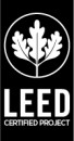 Leed Certified Project in white capital letters underneath a circle around three leaves, against a black background