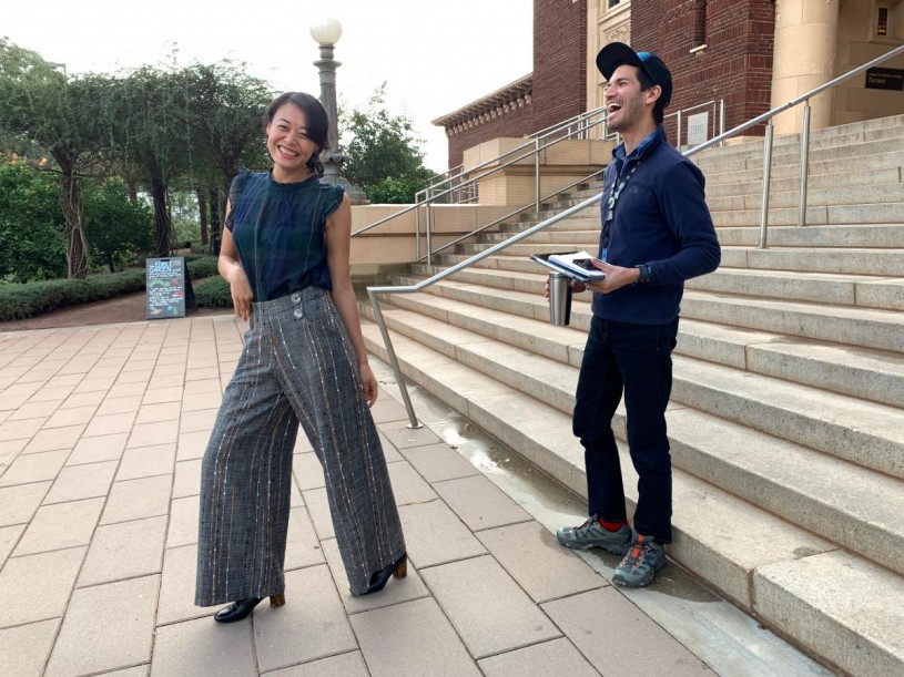 Jane striking a pose, Richard laughing outside NHM