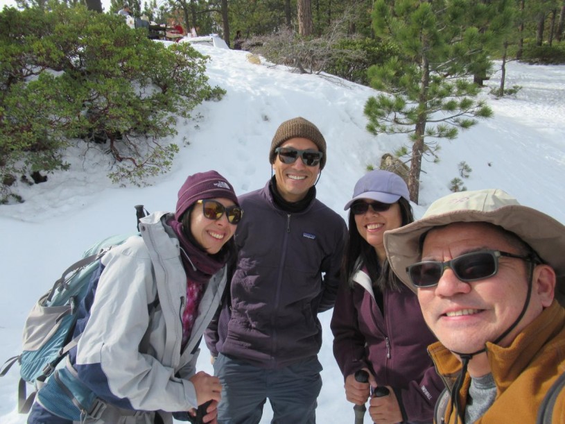 Dennis and his friends hiking in the recent snow in the San Gabriel Mountains.