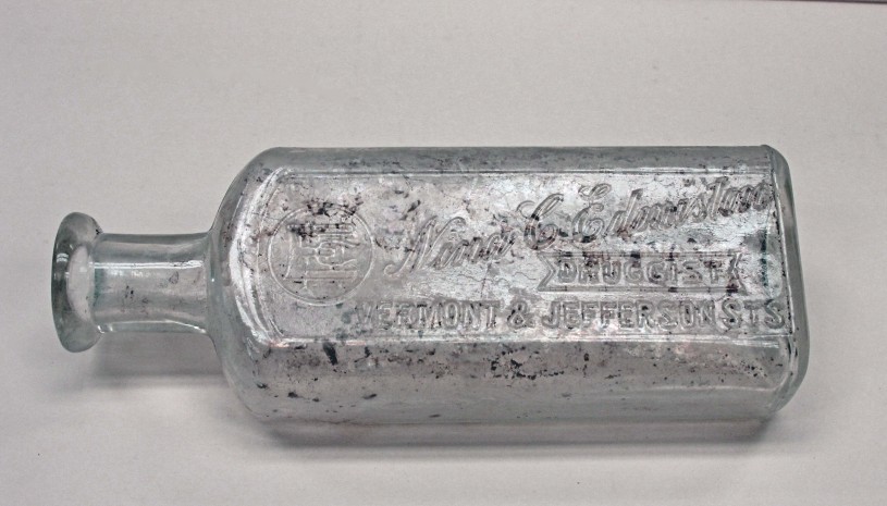 Clear glass drug bottle from turn of the century 