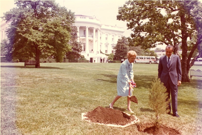 President Richard Nixon and First Lady Pat Nixon plant a tree on the White House South Lawn to recognize the first Earth Day.