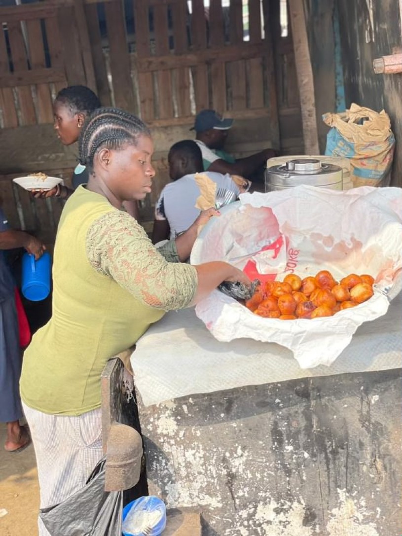 Woman makes puff puffs in Cameroon