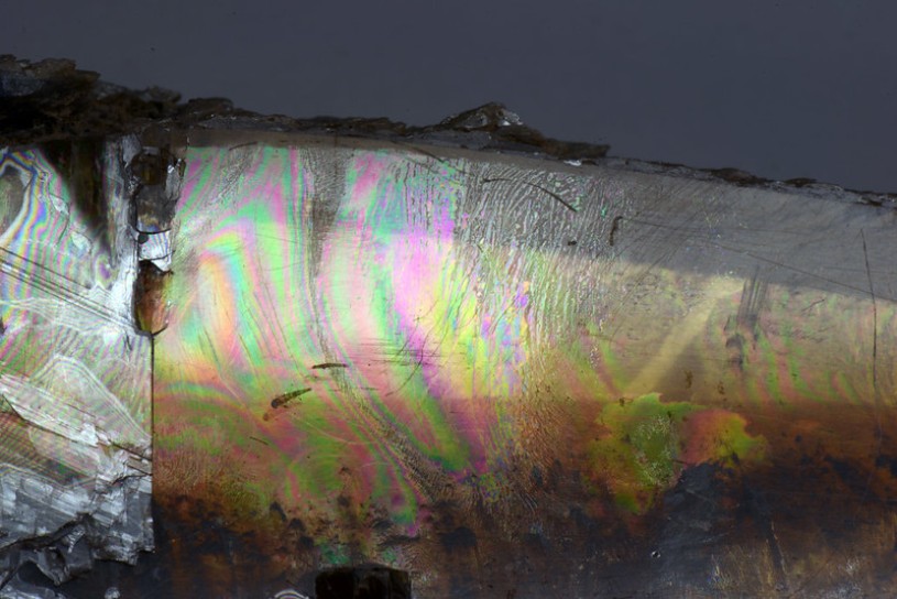 Iridescence along cleavage plane of gypsum from NHM Collections