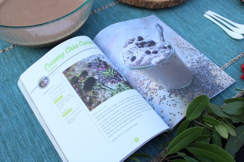 Cookbook open to the recipe page for chia cacao pudding