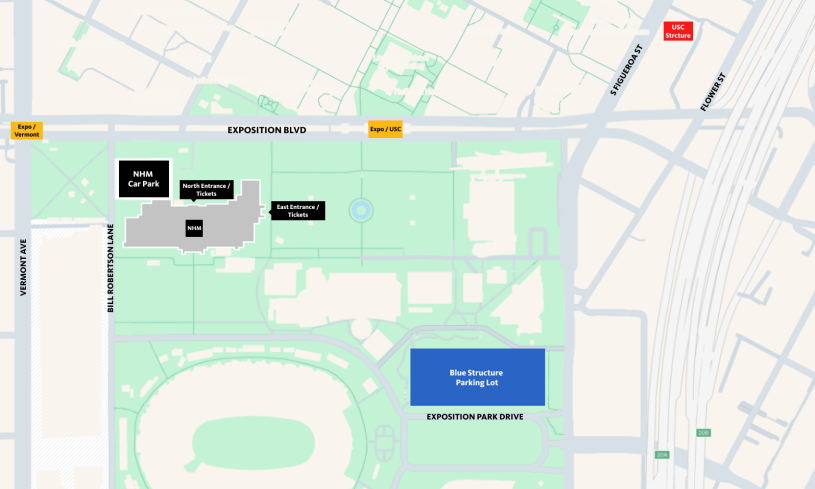 Map of gray-colored streets with black and blue rectangles indicating parking lots