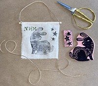 Image of a sample House Banner activity (features a rabbit and stars)